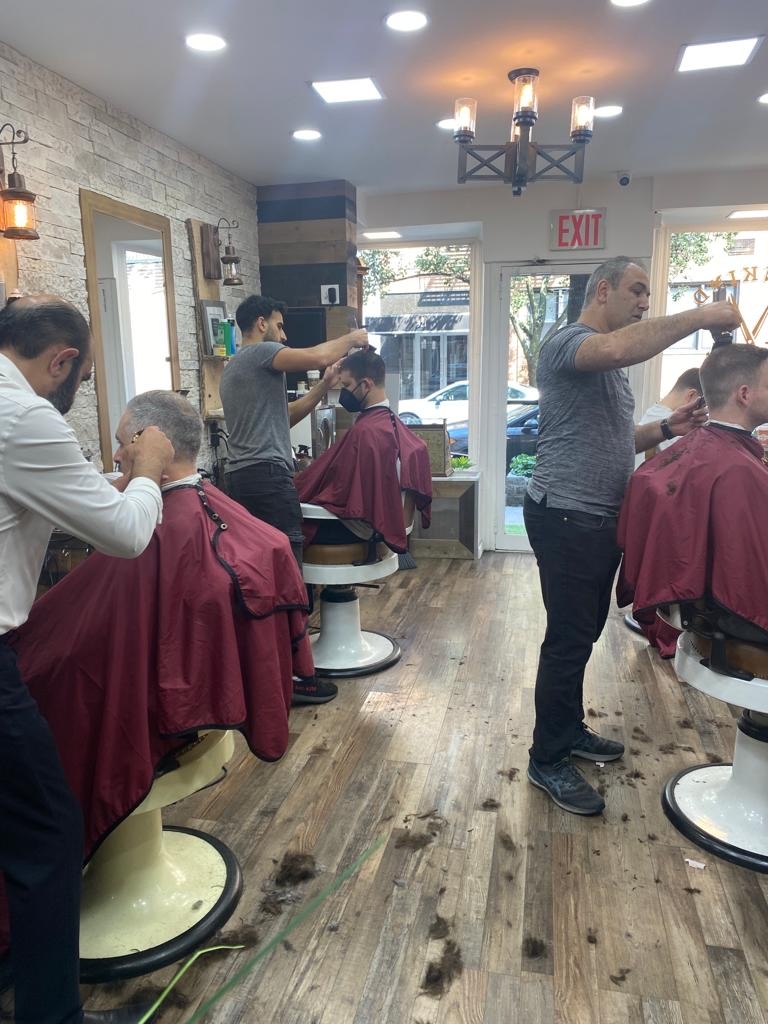 How can someone sign up for a membership at the barber shop and start enjoying the benefits?