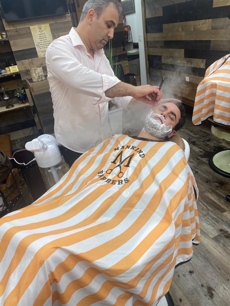 Are there any specific training programs or certifications for barbers who specialize in providing a relaxing experience for their clients?