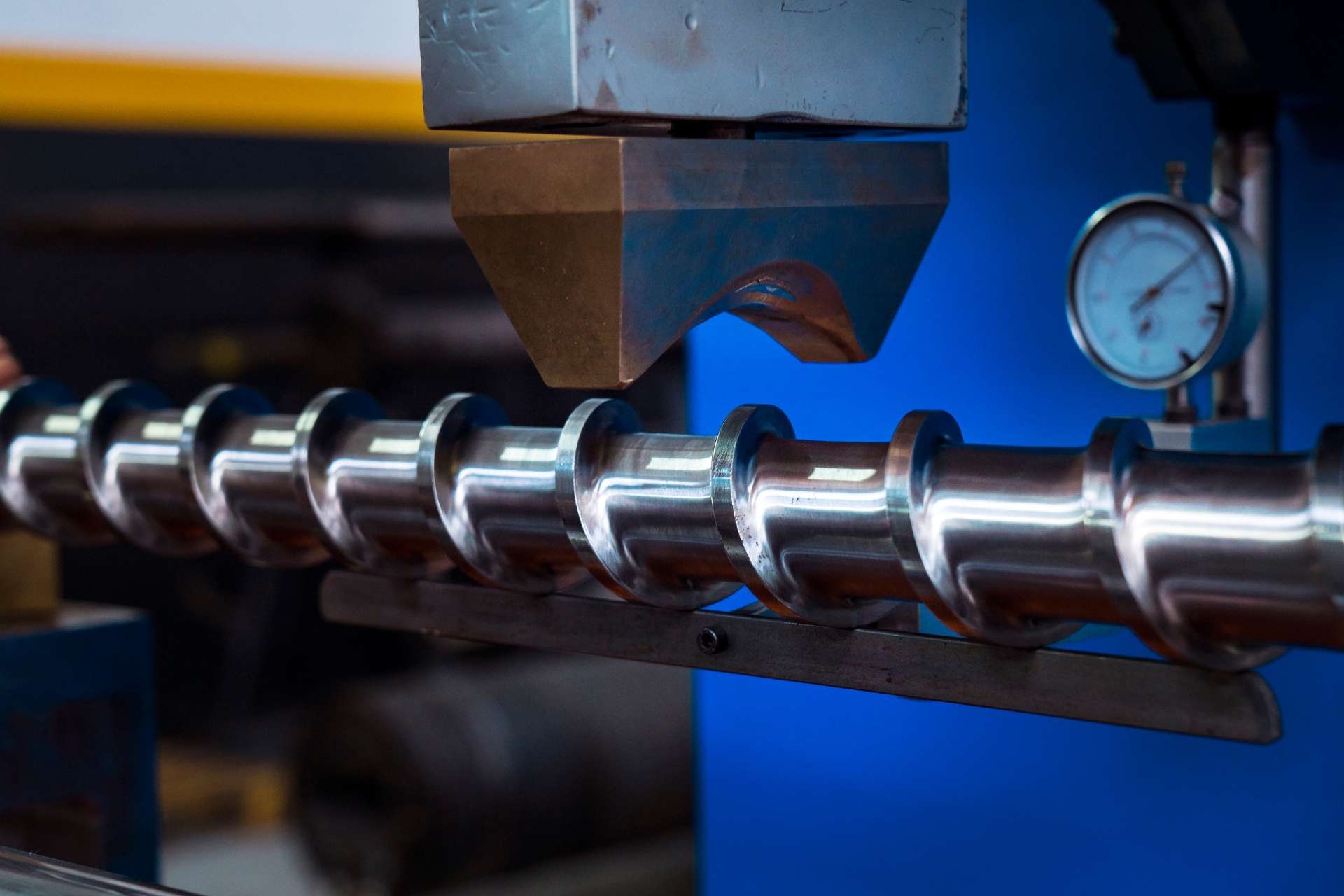 How do manufacturing tolerances affect lead accuracy in ball screws?