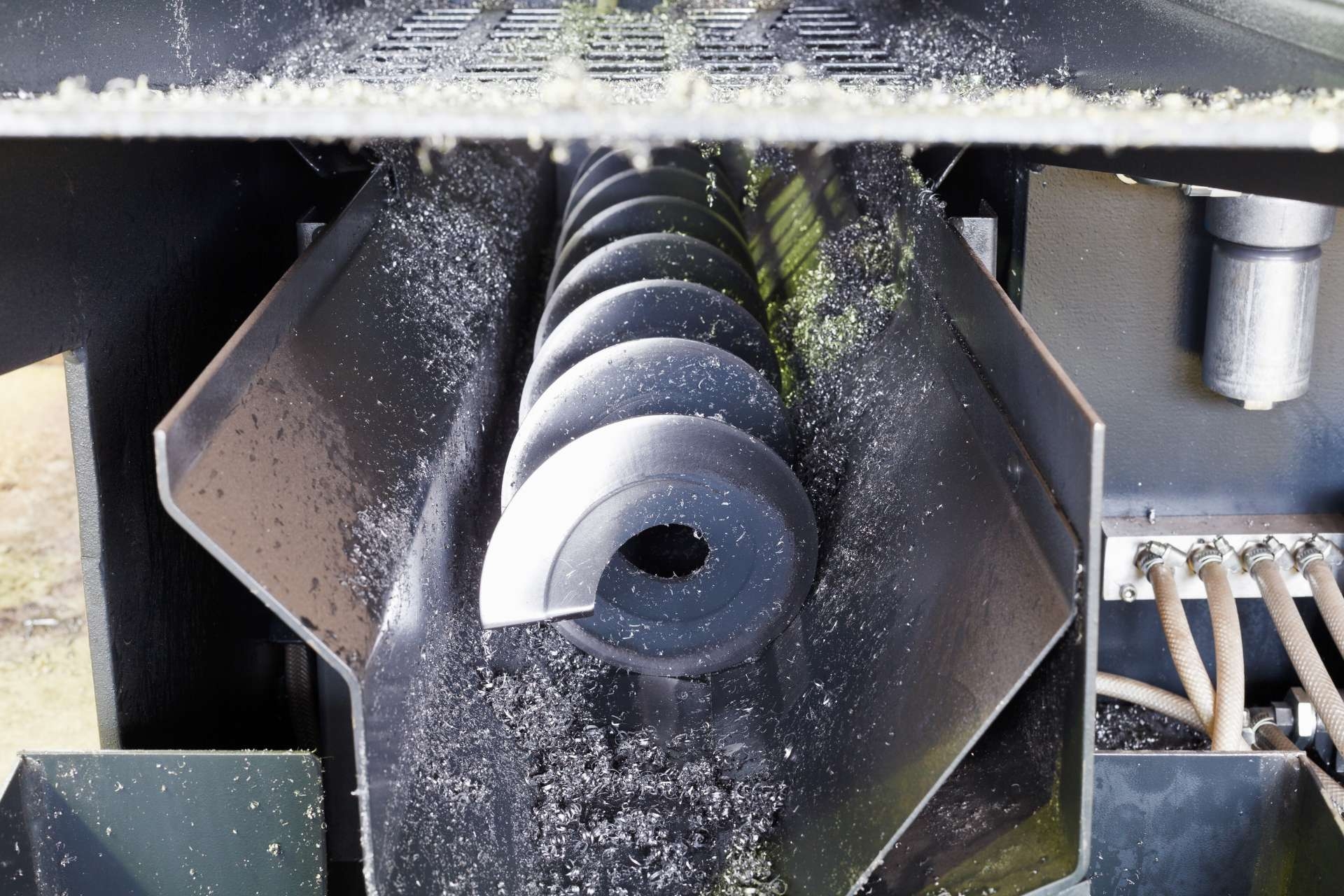 What are the benefits of using wear debris analysis in maintenance programs?