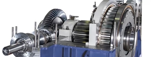 What role does load capacity play in determining the appropriate material for gear bearings?