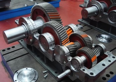 What are the advantages of using automated electroplating systems for gear components over manual processes?