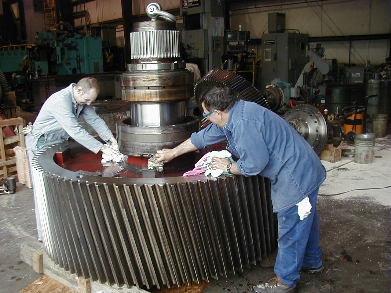 How can regular maintenance and inspection help prevent gear housing corrosion?