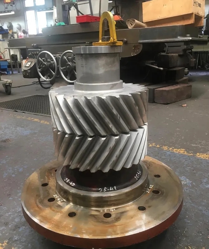 What are the typical hardness values achieved through different surface hardening methods for gearbox gear teeth, and how do they impact the overall performance of the gears?